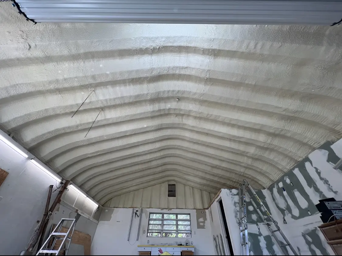 Spray polyurethane foam applied to the underside of a metal roof deck in Southwest Ranches